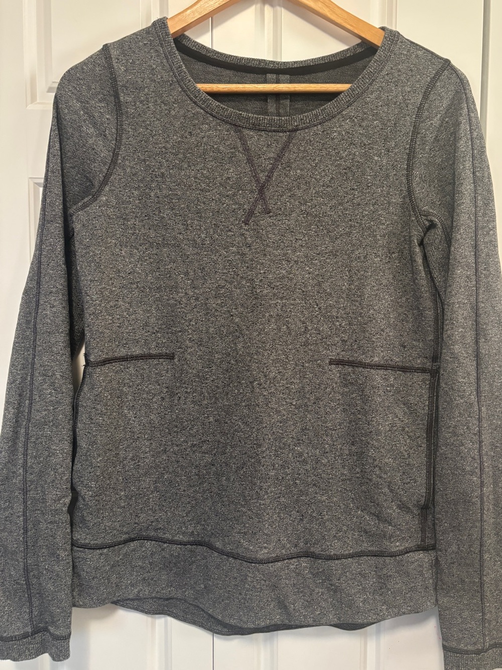 Lululemon Exhalation Pullover II in the colorway Heathered Speckled Black.